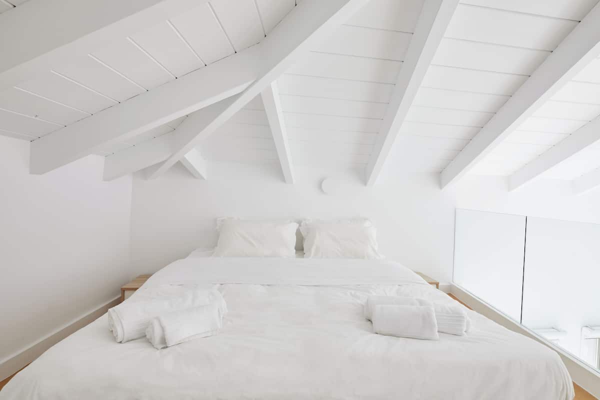 Clock Tower Grand View Suite | Sábanas de algodón egipcio y ropa de cama de alta calidad