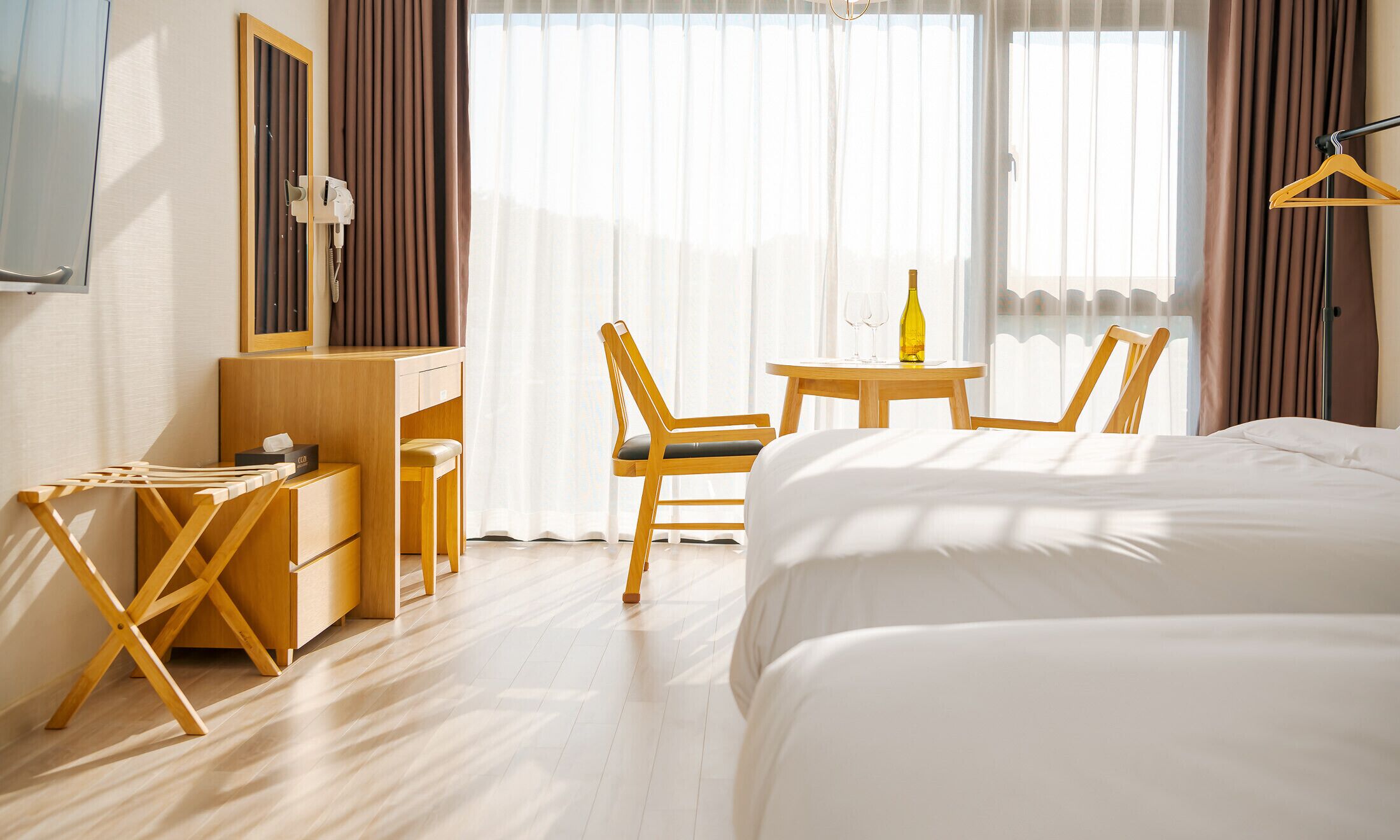 Premium bedding, desk, laptop workspace, free WiFi