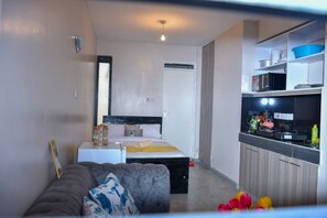 Deluxe Studio | Private kitchen | Fridge, microwave, cookware/dishes/utensils - Stay.Plus Tsavo Studio Apartment (Nairobi)