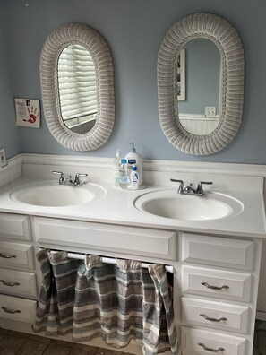 Combined shower/tub, hair dryer, towels, toilet paper