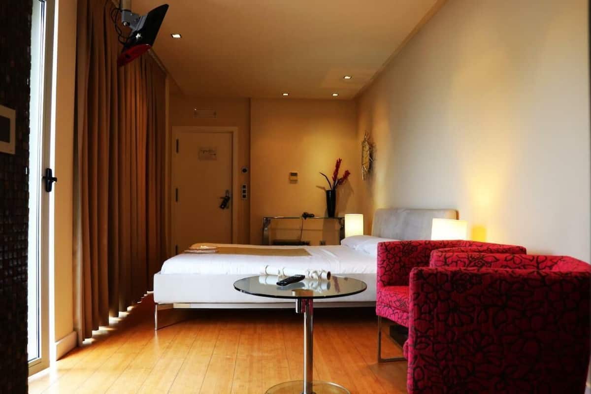 In-room safe, desk, laptop workspace, blackout curtains