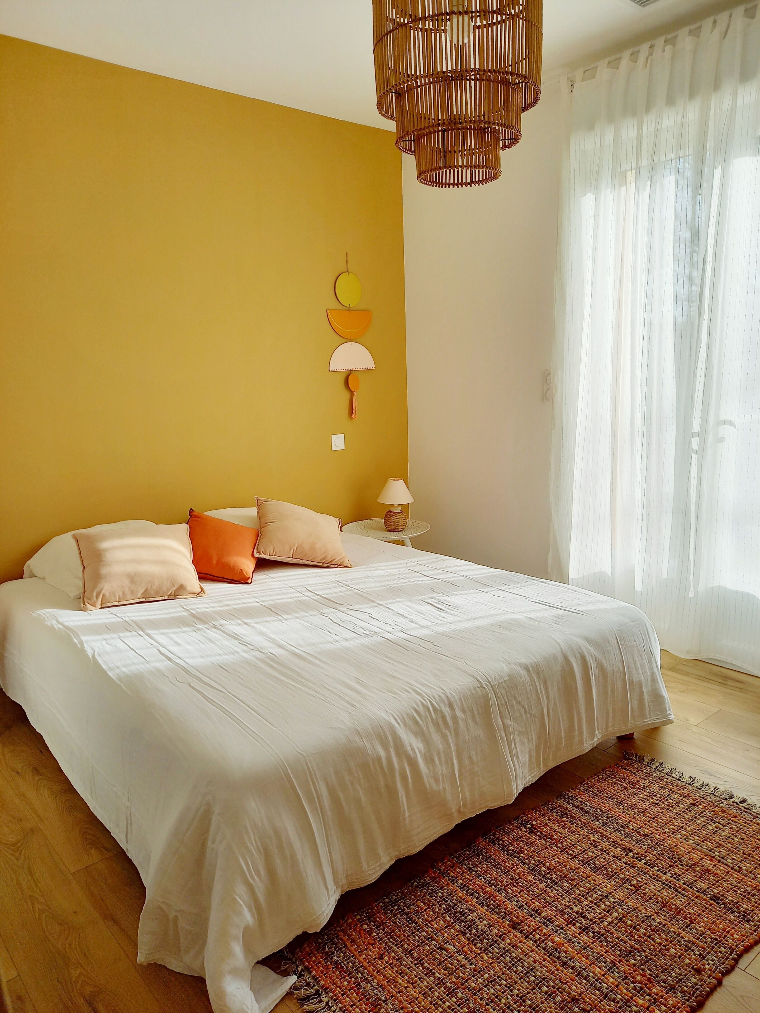 Three wooden houses with terraces near the ocean