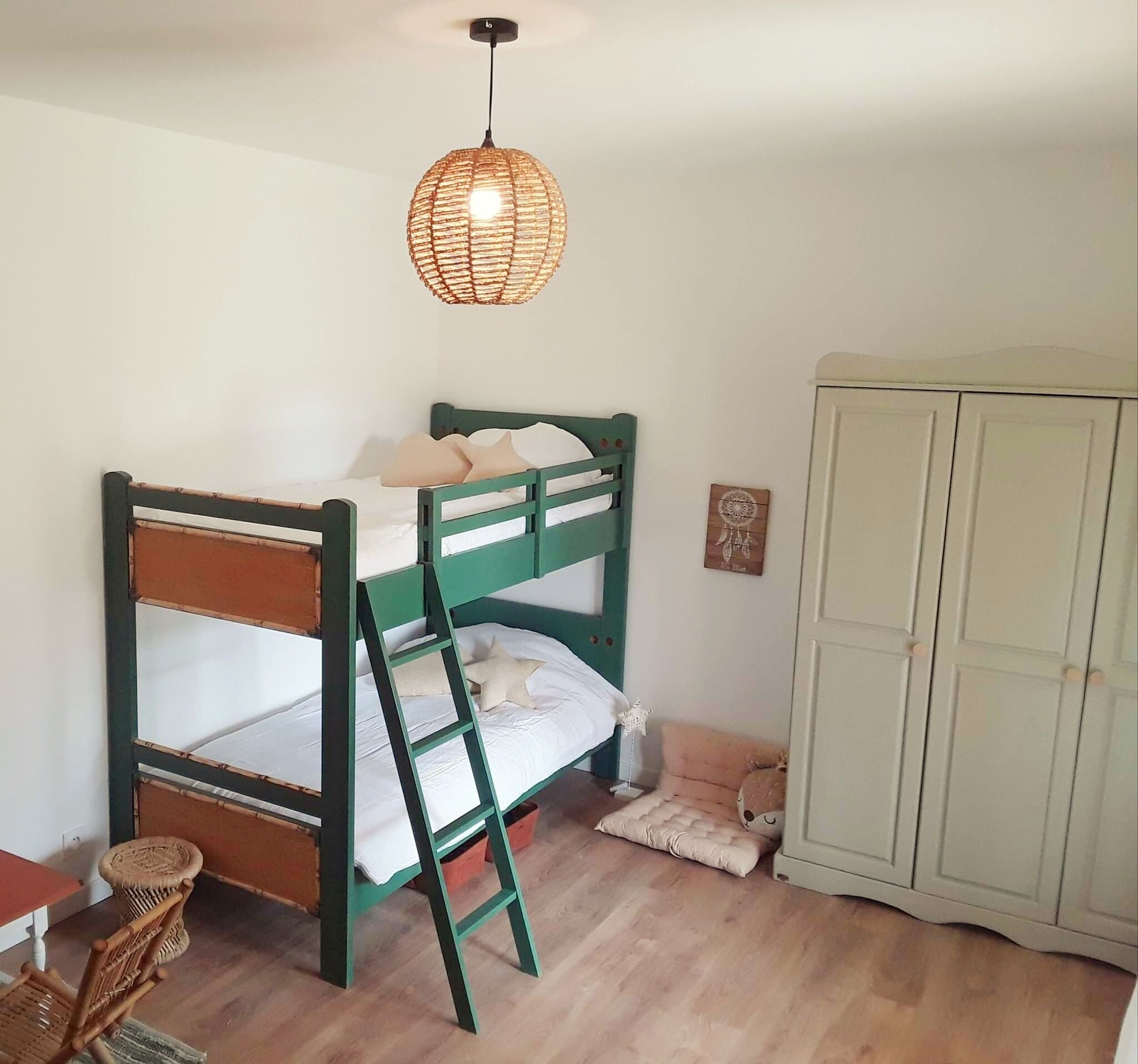 Three wooden houses with terraces near the ocean