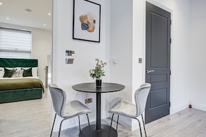 Apartment, 1 Queen Bed | 1 bedroom, iron/ironing board, free WiFi, bed sheets