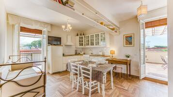 Standard Apartment, 2 Bedrooms (Terrazza Apuana A Few Steps From The) | Private kitchen | Fridge, stovetop, cookware/dishes/utensils, freezer