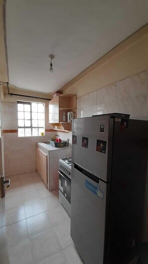 Comfort Apartment | Private kitchen | Fridge, microwave, cookware/dishes/utensils