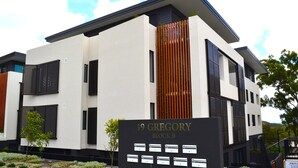 A modern building with a sign reading "19 Gregory Block B". - 301 THE LOOKOUT PENTHOUSE (South West Rocks)