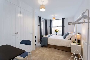 2 bedrooms, desk, iron/ironing board, travel cot