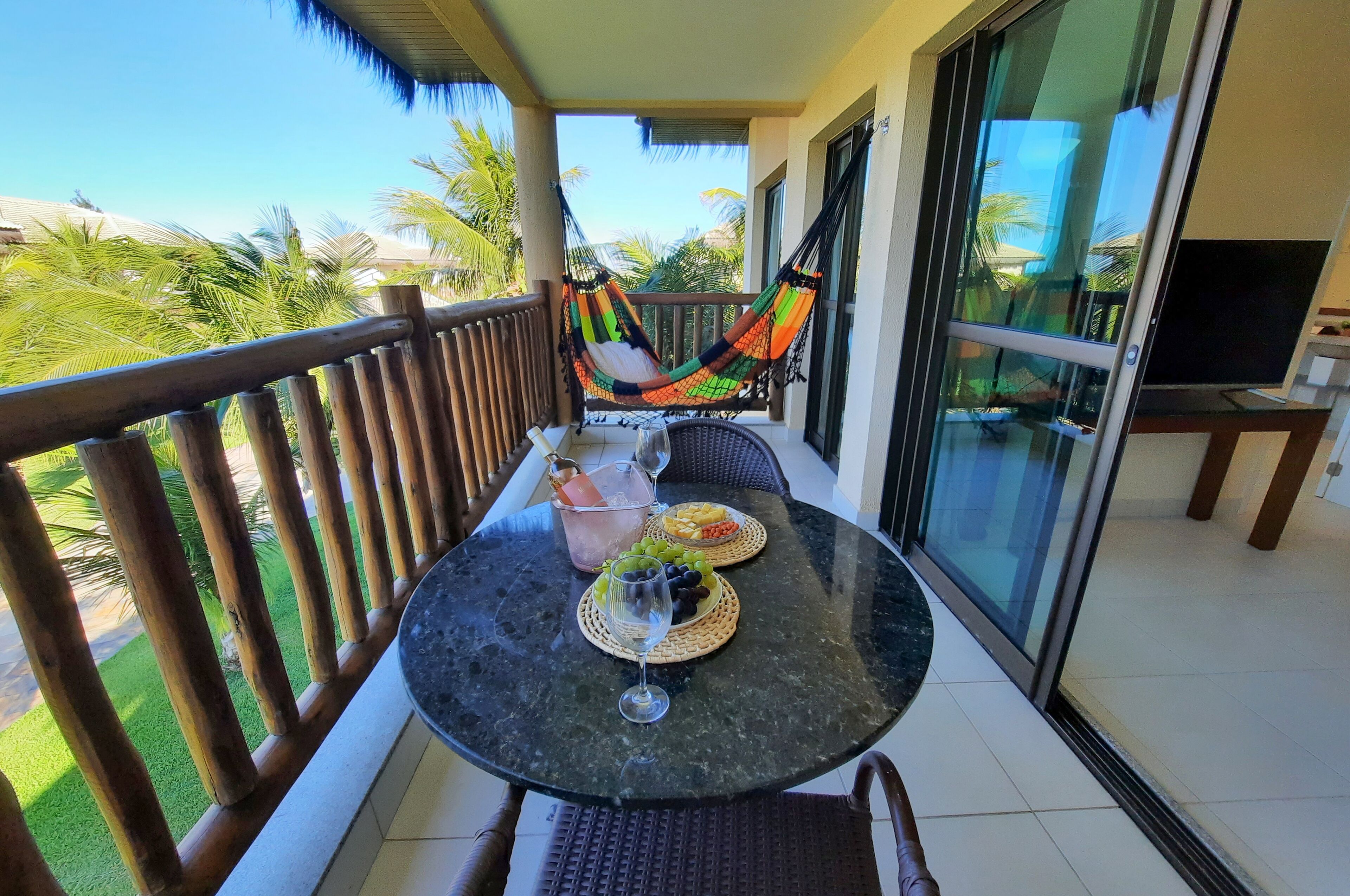 Apartamento superior, 2 quartos, vista para o jardim | Varanda coberta