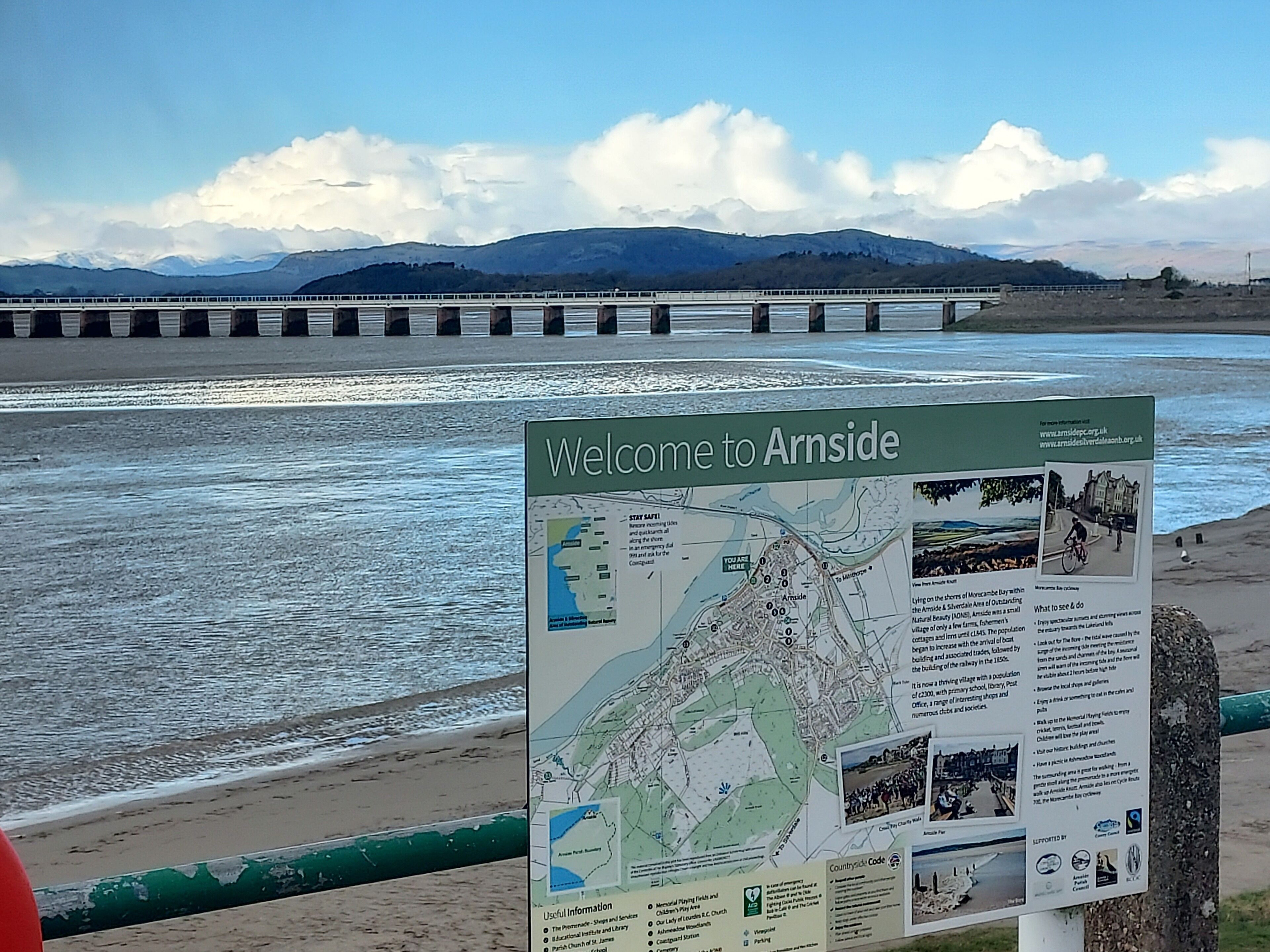 A welcome sign to Arnside with a map and information about the area.