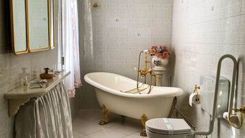 Bathtub, hair dryer, bathrobes, bidet