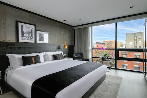 Superior King Room | Premium bedding, in-room safe, desk, blackout drapes