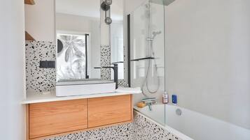 Bathtub, hair dryer, towels