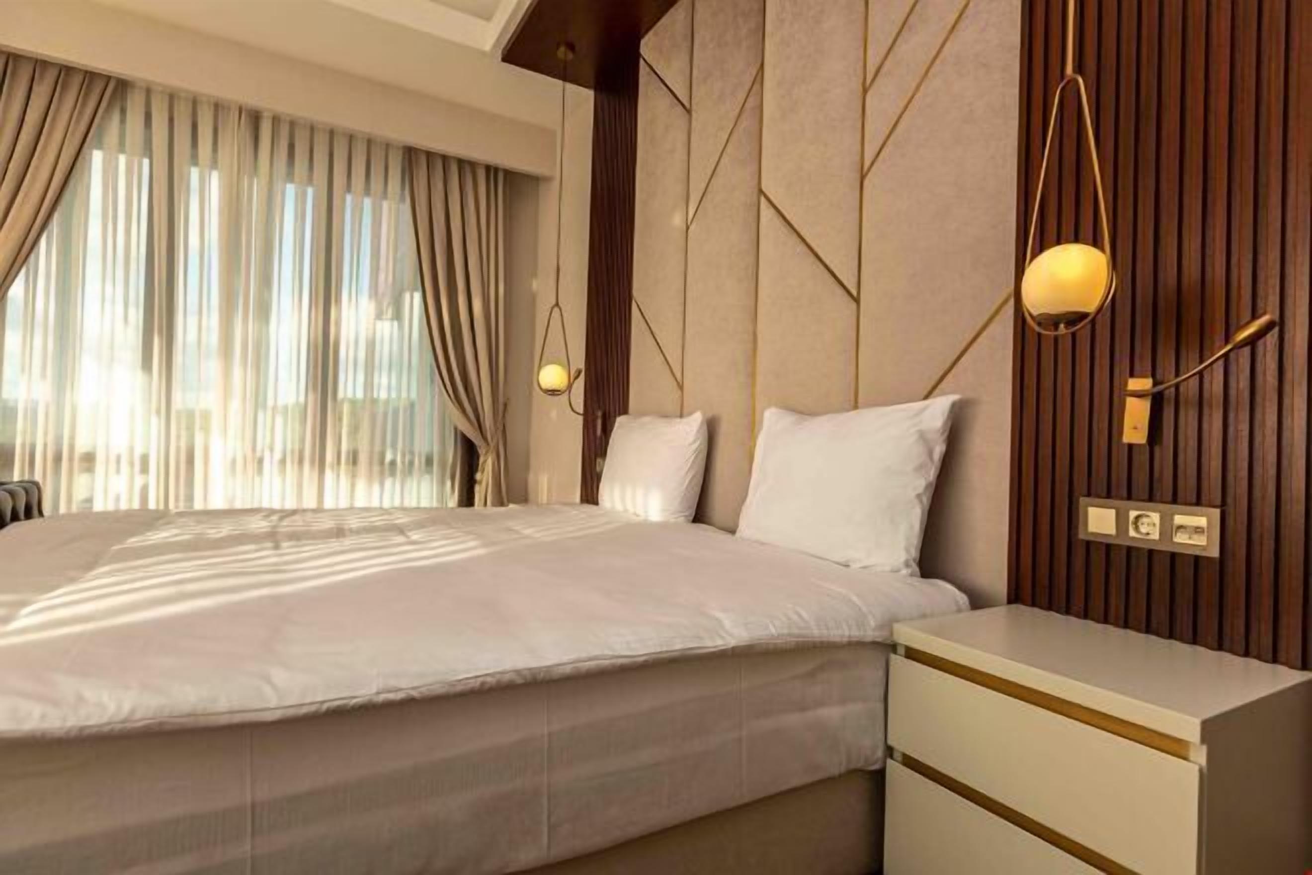 메모리폼 침대, 객실 내 금고, 책상, 노트북 작업 공간