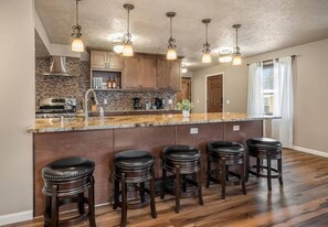 Fridge, microwave, oven, stovetop - Spokane South Hill entertainer’s haven w/ theater, wine room & BBQ patio. (Spokane)