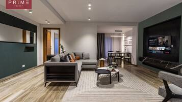 Apartment, 1 Bedroom | Living area | LED TV