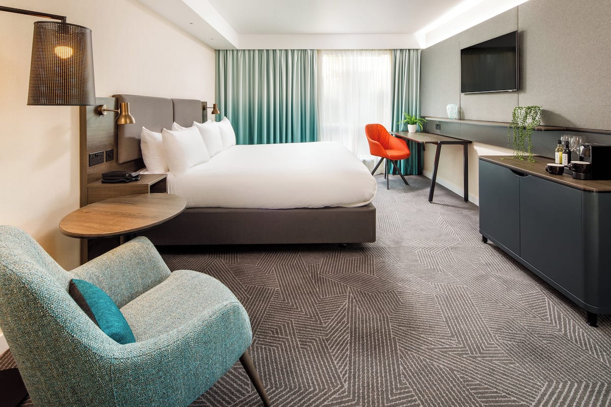 Suite, 1 King Bed with Sofa bed | 1 bedroom, hypo-allergenic bedding, in-room safe, desk