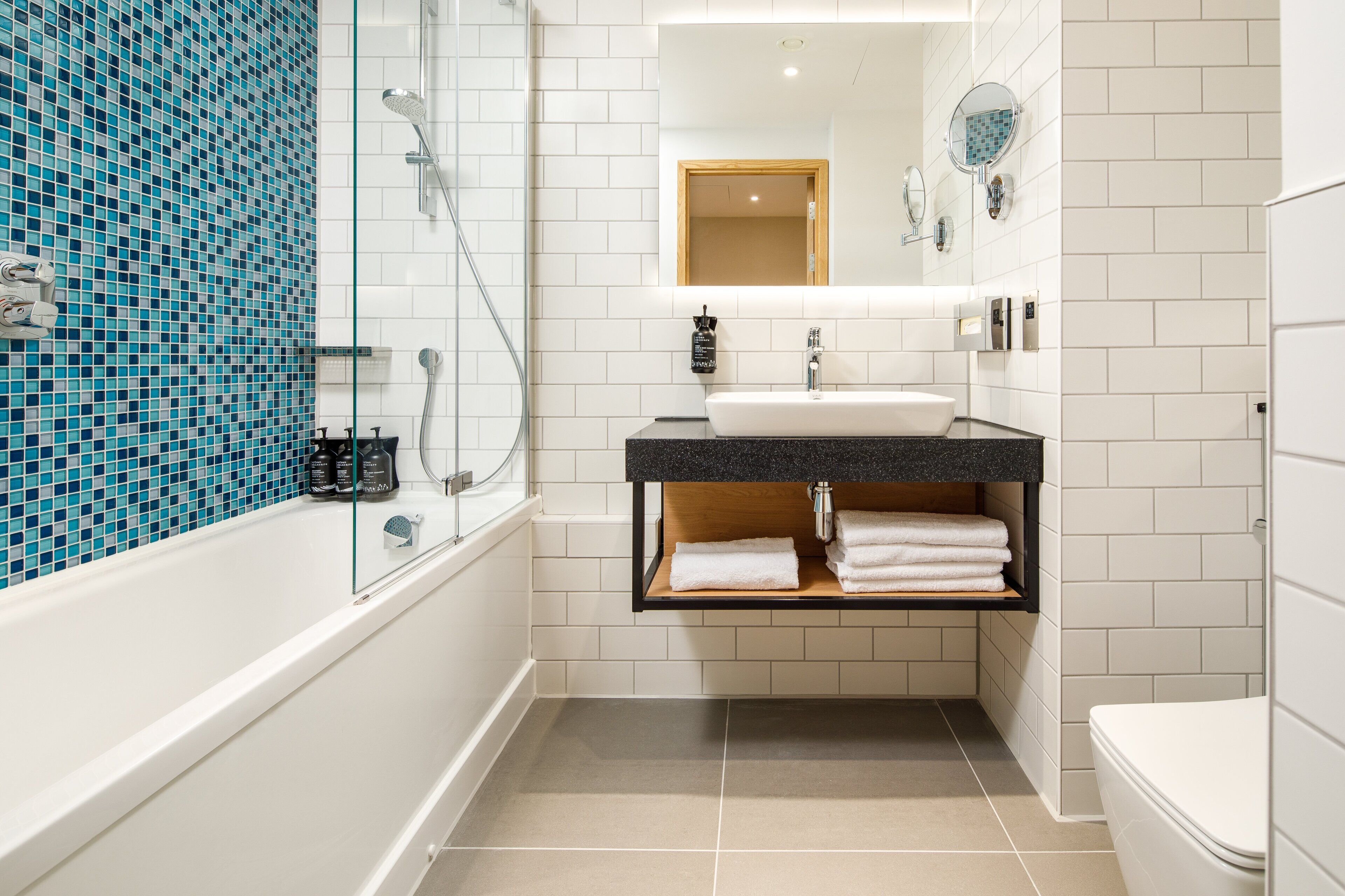 hair dryer, towels, soap, shampoo