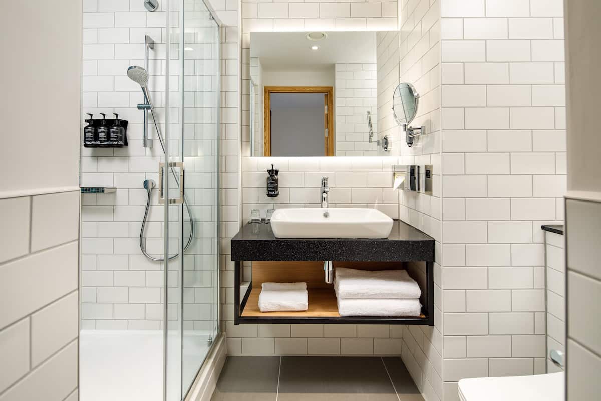 hair dryer, towels, soap, shampoo