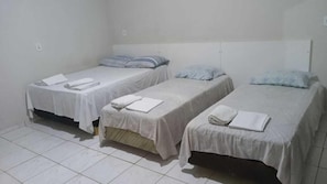 Desk, laptop workspace, blackout curtains, iron/ironing board