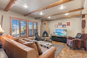 Smart TV, fireplace, DVD player, books