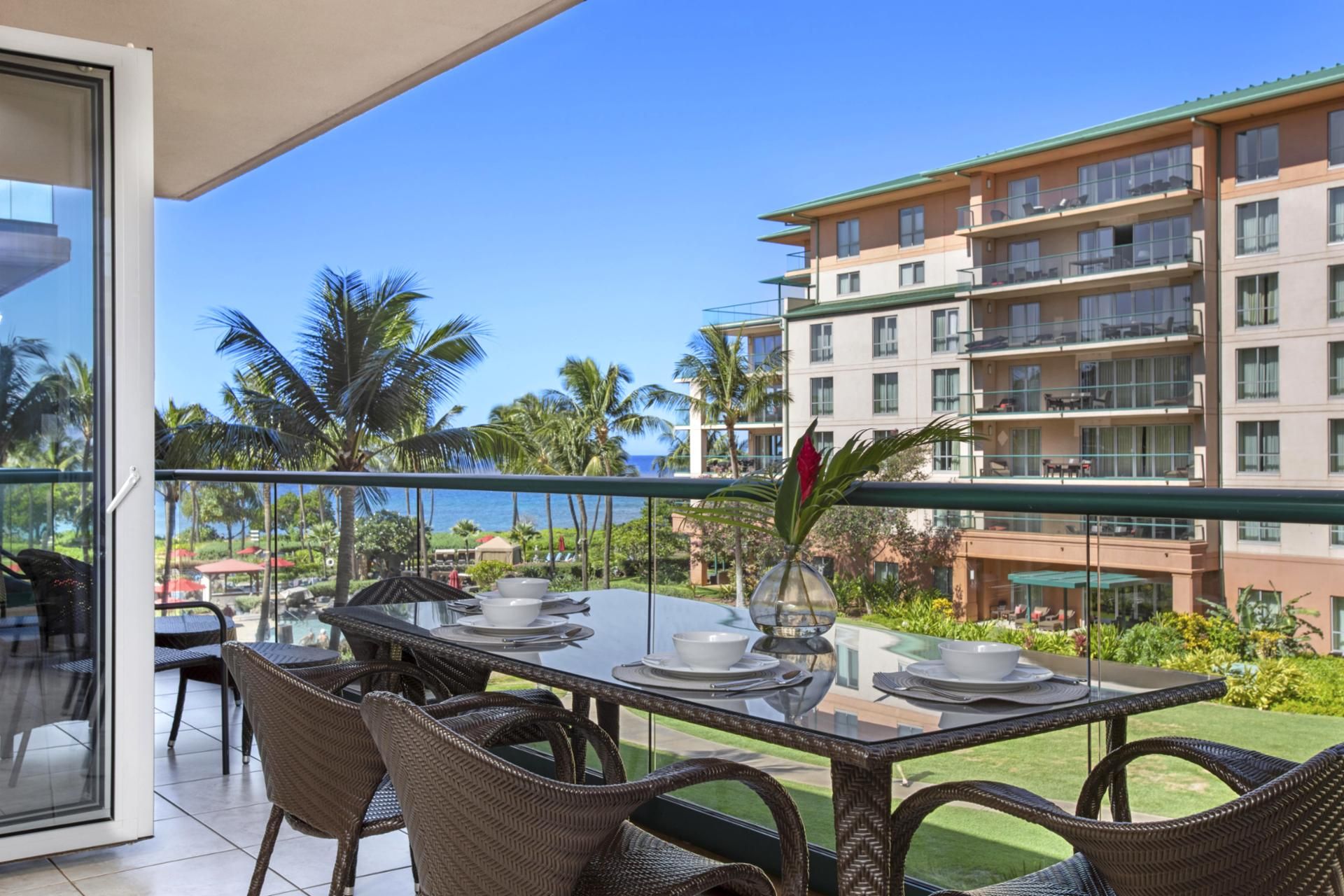 Dine with ocean views, swaying palms, and tropical serenity surrounding.