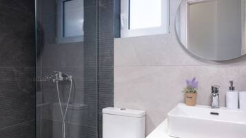 Shower, free toiletries, hair dryer, bathrobes