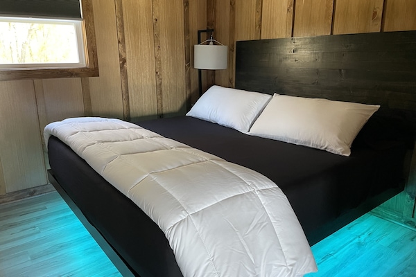 Bedroom 1 king size floating bed with LED lights