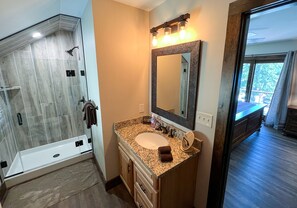 Combined shower/tub, hair dryer, towels, soap