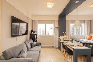 Traditional Studio | Living area | 32-inch LCD TV with cable channels, TV