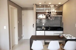 Deluxe Double Room | Private kitchen | Fridge, microwave, coffee/tea maker, electric kettle