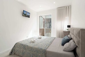 3 habitaciones, tabla de planchar con plancha, cuna de viaje y wifi 