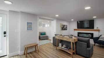 TV, fireplace, books, offices