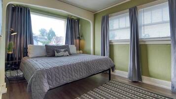 1 bedroom, desk, iron/ironing board, travel crib