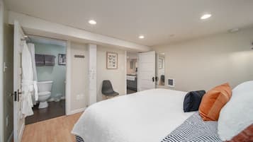 1 bedroom, desk, iron/ironing board, travel cot