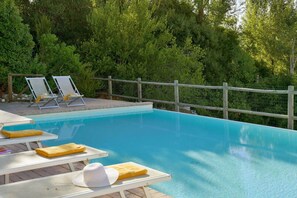 Outdoor pool, a heated pool - Spacious villa with heated pool, A/C, Wi-Fi, BBQ, al fresco dining, sleep 20 (La California)