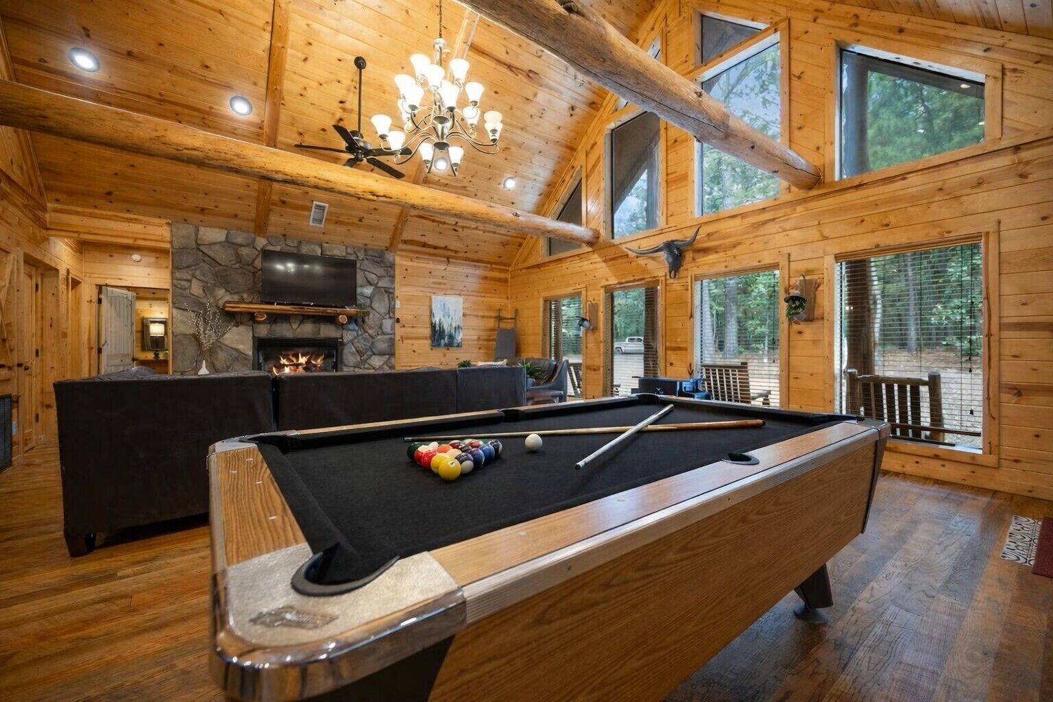 Laughter echoes through the cabin as the fire crackles and someone yells, “One more game!” Between the pool table, pub table, and arcade machine.  This is where memories are made.