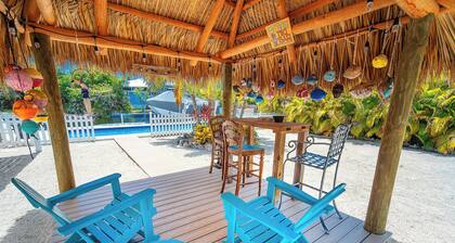 Tropical Oasis with Beautiful Home, Pool, Dock and Tiki Hut