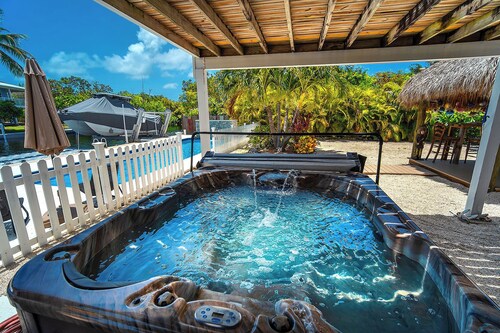 Tropical Oasis with Beautiful Home, Pool, Dock and Tiki Hut