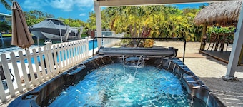 Tropical Oasis with Beautiful Home, Pool, Dock and Tiki Hut