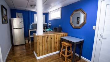 Fridge, microwave, stovetop, coffee/tea maker