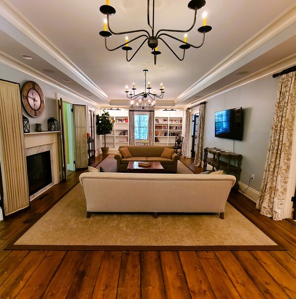 Smart TV, fireplace, books