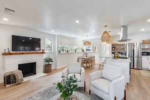 Smart TV, fireplace, books