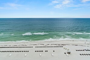 On the beach, sun loungers, beach towels