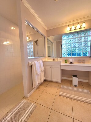Combined shower/tub, hair dryer, towels, soap