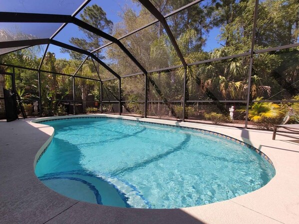 Outdoor pool, a heated pool - Beautiful Heated Pool House with Backyard Oasis (North Port)