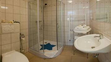 Shower, free toiletries, hair dryer, towels
