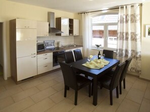 Imagen sin descripción, 5 de 7, botón