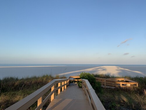 Beautifully remodeled condo offering breathtaking Gulf views right on the beach.