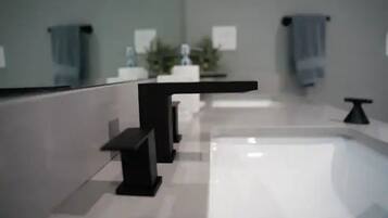 Combined shower/tub, hair dryer, towels, soap